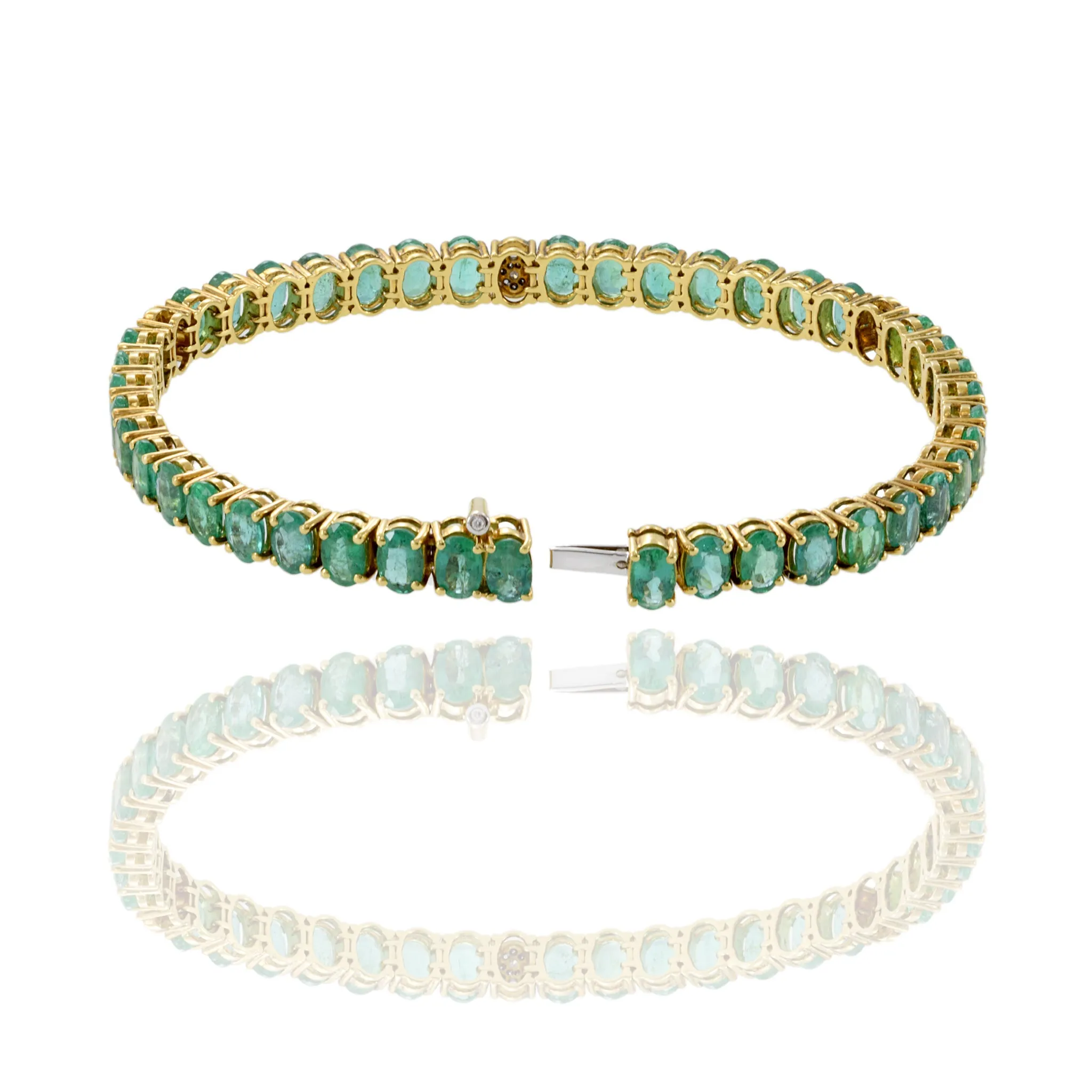 18KT Yellow Gold Diamond And Emerald Bracelet