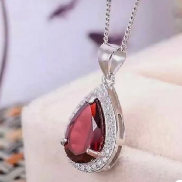 Elegant 2.00ctw Created Ruby and White Sapphire Teardrop Solitaire Pendant In Sterling Silver