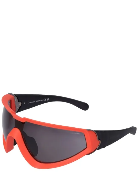 Moncler   Wrapid futuristic shape sunglasses 