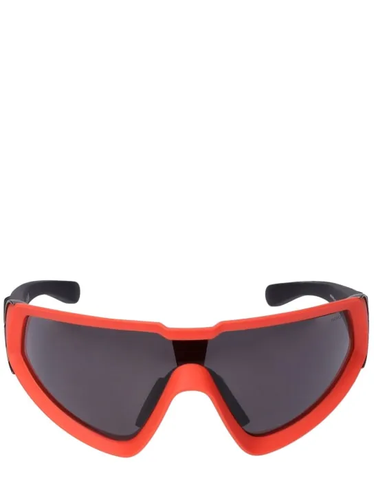 Moncler   Wrapid futuristic shape sunglasses 