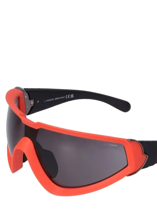 Moncler   Wrapid futuristic shape sunglasses 