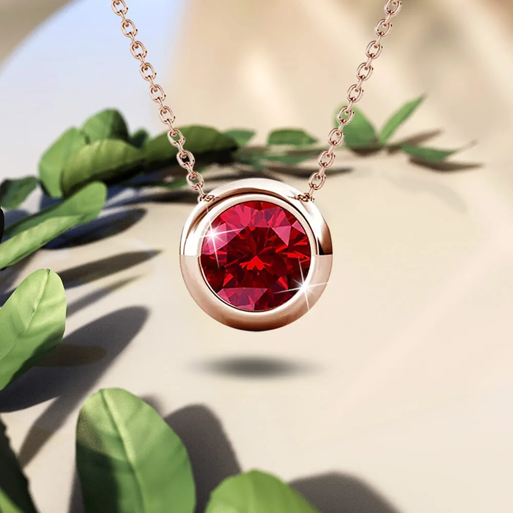 Opulence Pendant Necklace Embellished with Ruby SWAROVSKI Crystals in Rose Gold