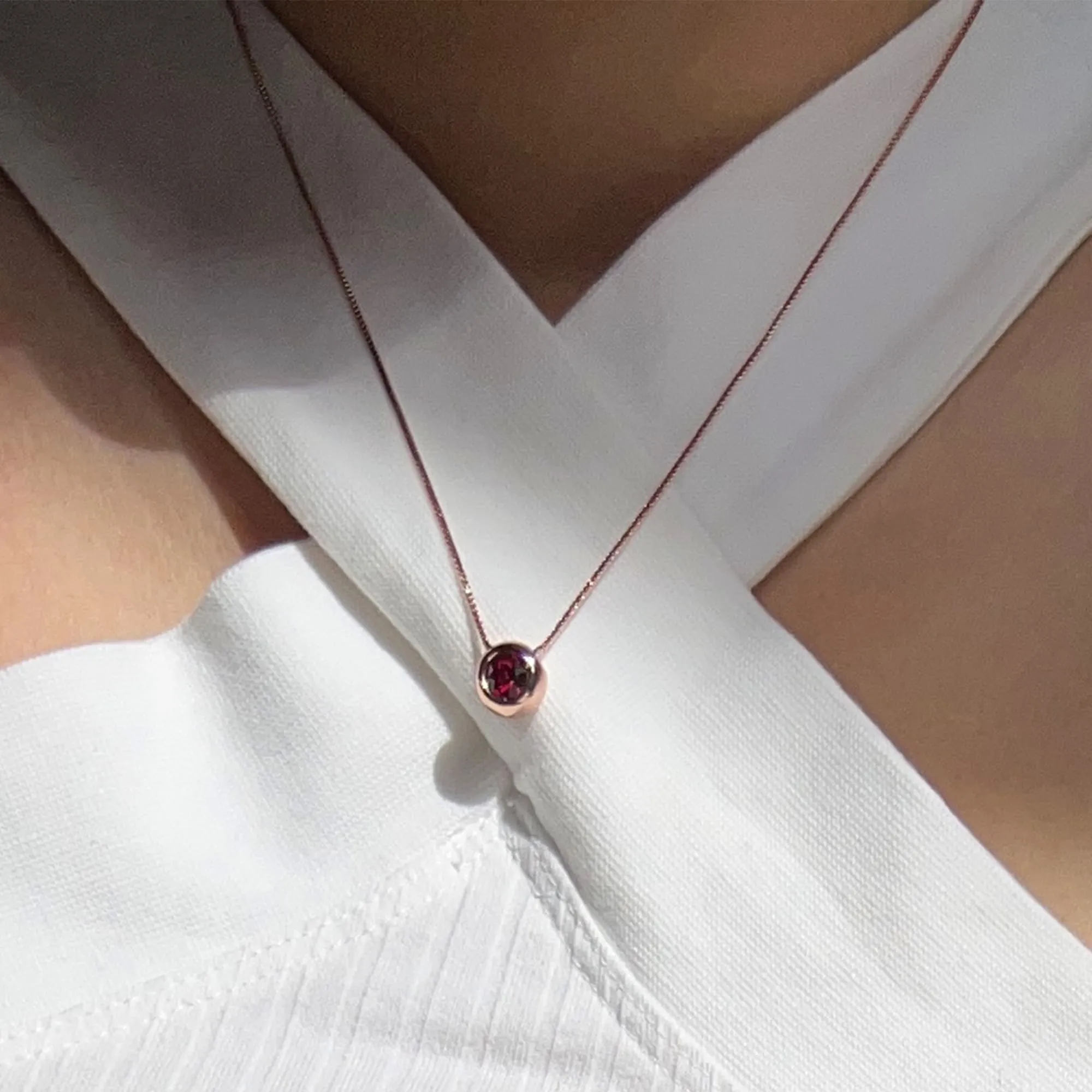 Opulence Pendant Necklace Embellished with Ruby SWAROVSKI Crystals in Rose Gold