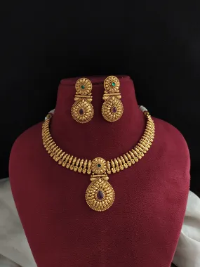 Plain Antique Gold Necklace Set with Ruby and Green Stones